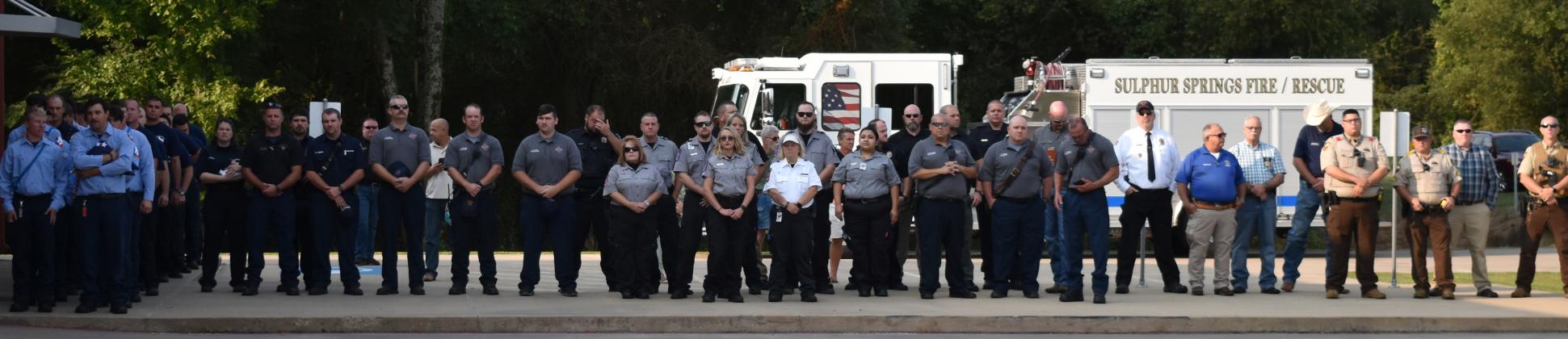 County first responders watch the 9/11 ceremony.