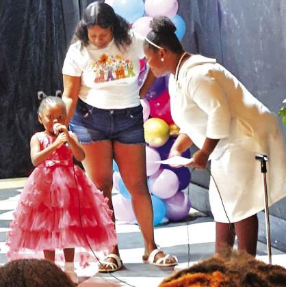 Tiny Miss Juneteenth contestant Ariyah McGill stole the show during her interview. She didn't wait for the emcee's question and even took the microphone from her.