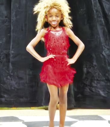 During her talent presentation, Raquel Rogers portrayed rock legend Tina Turner's iconic 'Proud Mary' dance moves. Not even technical difficulties could stop her 'big wheels' from rolling.