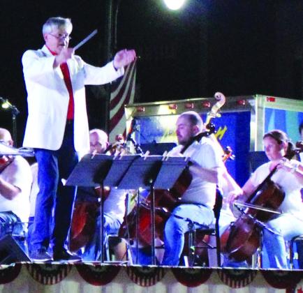 Dr. Douglas Bakenhus will once again conduct the Northeast Texas Symphony Orchestra during the free 32nd Annual Independence Day Celebration and Fireworks Extravaganza on Celebration Plaza this Saturday, June 29, 2024. File photo