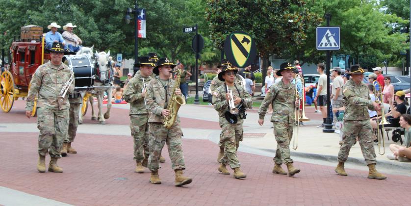 The 1st Calvary Division Army Band out of Fort Hoodlead the 2023 Hopkins County Dairy Festival Parade.