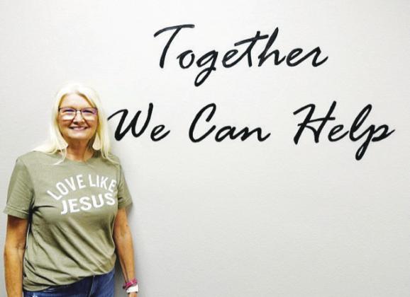 Senior citizen Angie Frew volunteers each week at CANHelp.