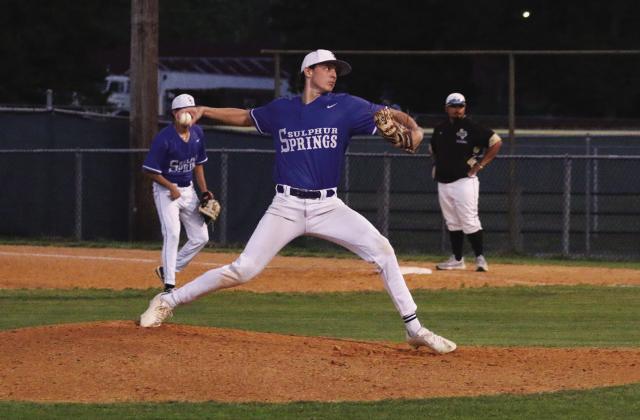 WINDING UP — Kaden Mitchell (15) winds up to deliver a pitch during a game against Pittsburg this past season. Mitchell earned second-team all-district honors as a pitcher following a good sophomore season. Submitted Photo