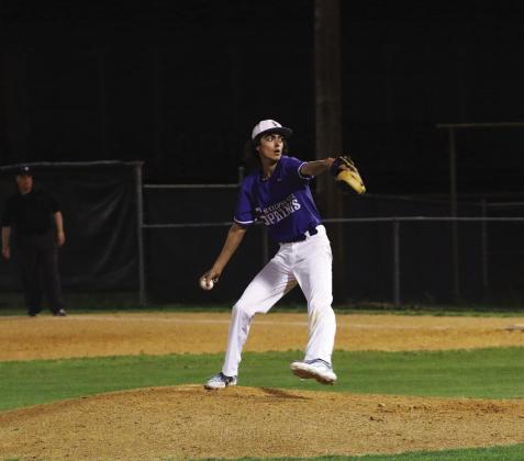 BRINGING HEAT — Ty Robinson (4) winds up to deliver a pitch during a game against Pittsburg this past season. Robinson earned second-team all-district honors for his play on the diamond this season. Submitted Photo