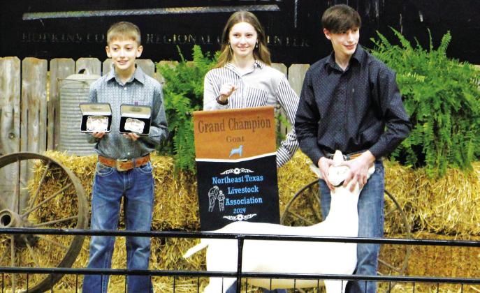 Isaac Taylor of Cumby FFA stands with his Grand Champion goat during the 2024 NETLA Junior Market Livestock Show and Sale, held Saturday, Feb. 24 at the Hopkins County Regional Civic Center.