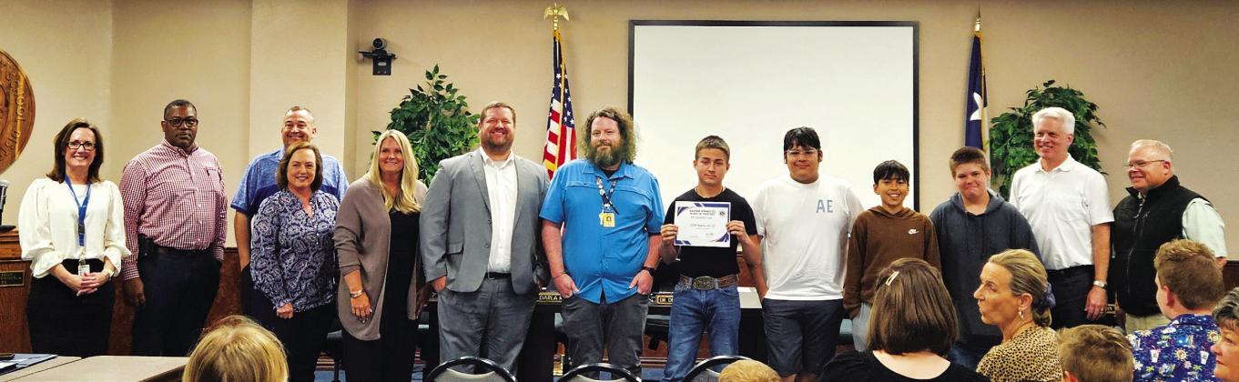 SSISD Board &amp; Robotics Students CUT: Sulphur Springs Middle School robotics teacher Bryan Cole introduced a few of his students, who recently participated in the VEX IQ State Championship in Dallas on March 23. Four teams will be competing at state in Dallas April 28-30. Staff photos by Tammy Vinson