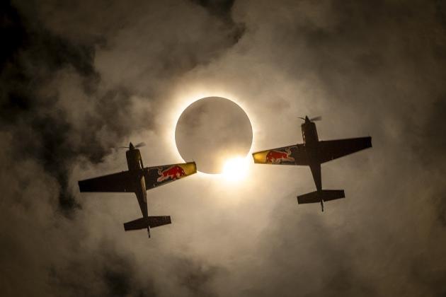 Red Bull pilots Kevin Coleman and Pete McLeod flew in tandem, 1,500 feet in the sky during the total eclipse Monday, April 8, in Sulphur Springs. Mashon Dustin Snipes, and Peter McKinnon captured the moment. Photo by Dustin Snipes and Mason Mashon / Red Bull Content Pool